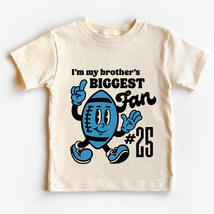 Children's t-shirt with vintage cartoon football mascot, text reads "I'm my brother's biggest fan #25" in bold font.