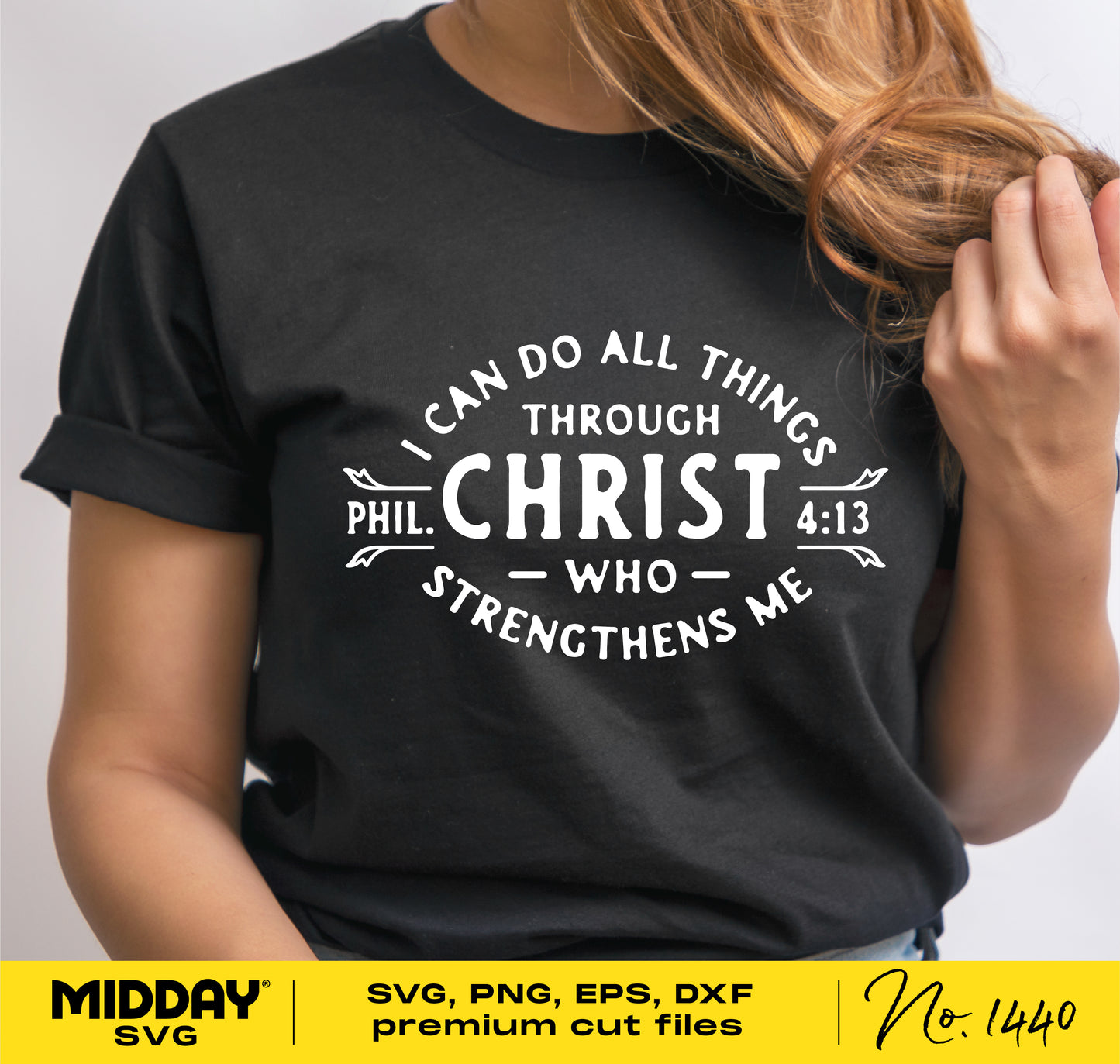 Woman wearing t-shirt with Philippians 4:13 Bible verse, "I can do all things through Christ who strengthens me."