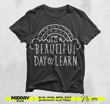 Black T-shirt with 'It's a Beautiful Day to Learn' white graphic, featuring rainbow design, ideal for teachers and educators.