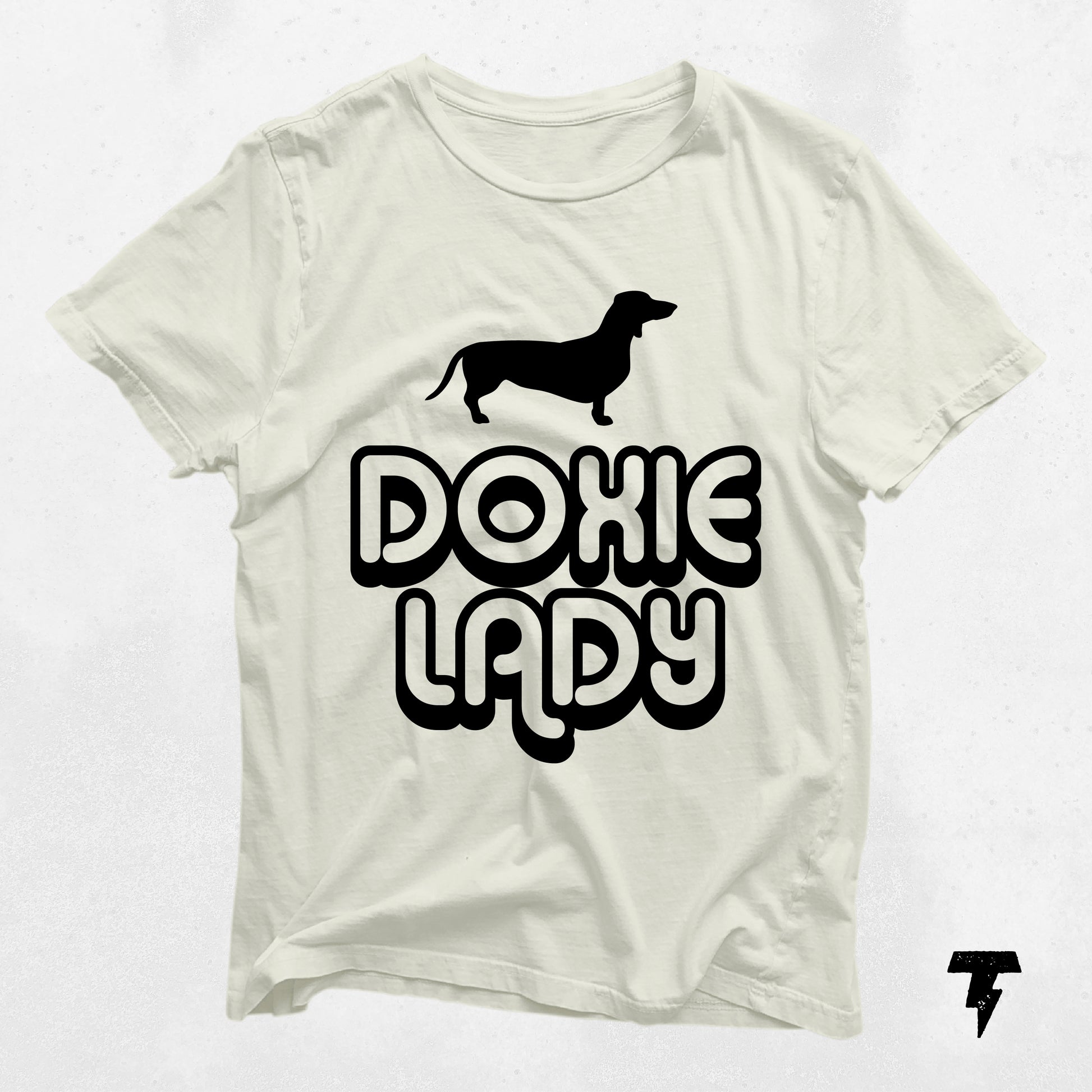 "Doxie Lady" dachshund graphic tee, soft cotton, perfect gift for dog moms, white shirt with black text and dog silhouette.
