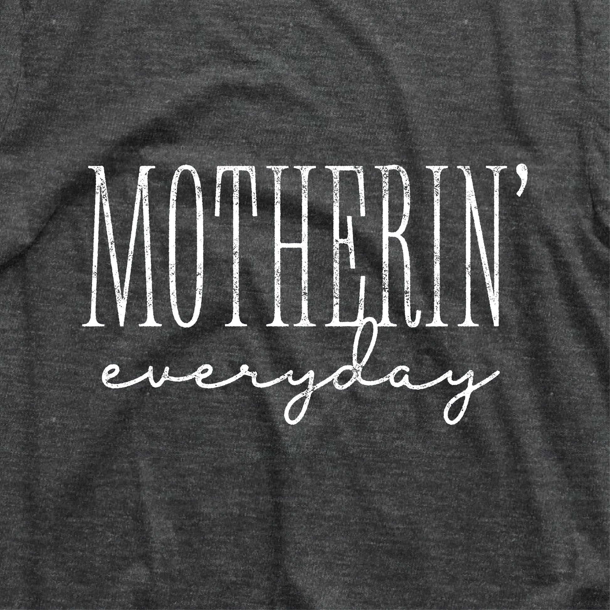 "Motherin' Everyday" funny mom shirt in black. 100% cotton, perfect baby shower gift, casual fit. Machine wash cold.