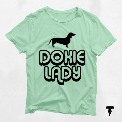 Mint green Doxie Lady shirt featuring a silhouette of a dachshund, perfect gift for dog moms and dachshund enthusiasts.