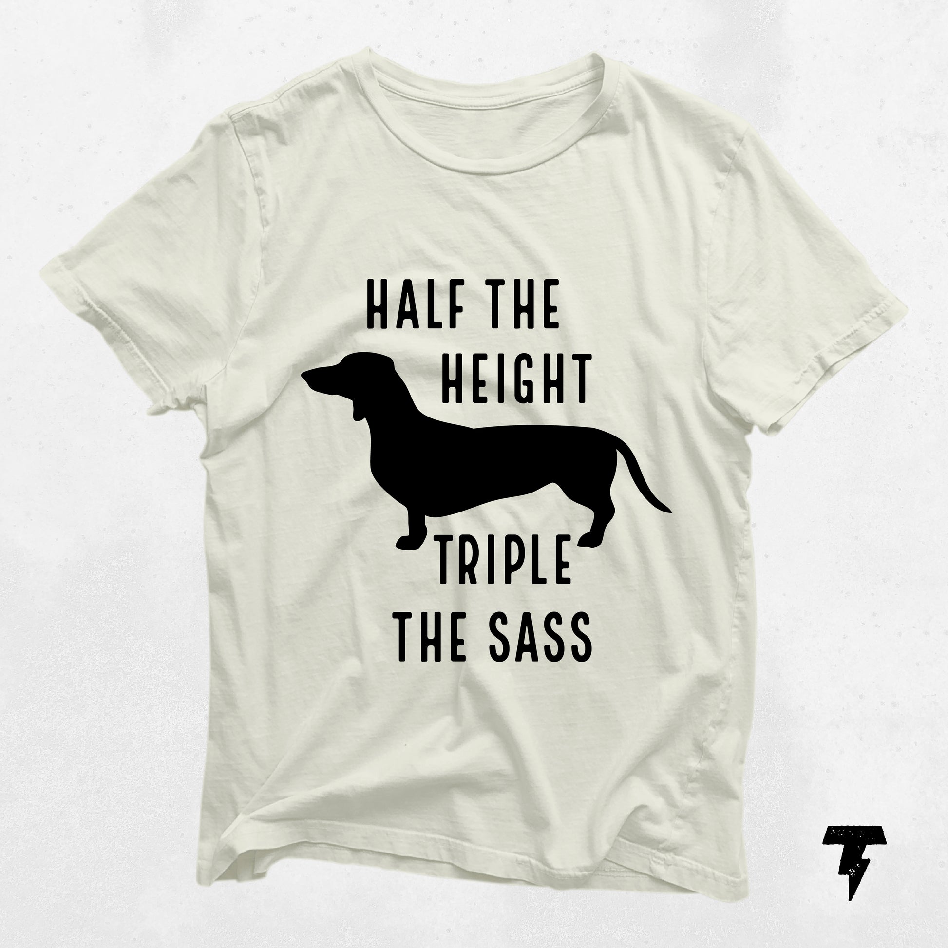 White dachshund shirt with 'Half the Height Triple the Sass' text, perfect gift for dog moms. Fun wiener dog apparel.