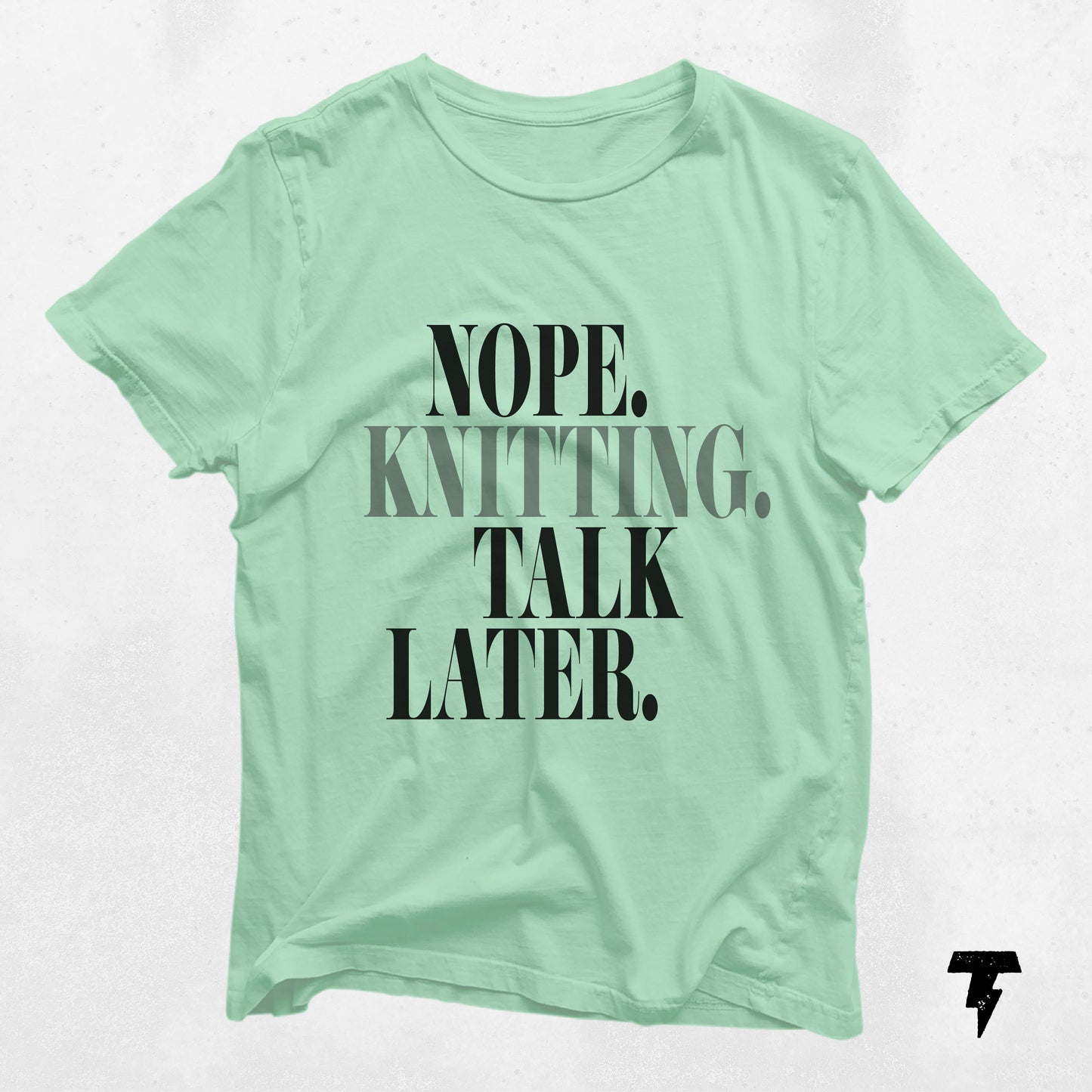 Funny knitting t-shirt with 'Nope. Knitting. Talk Later.' print, perfect for yarn lovers and crafters. Unisex jersey short sleeve tee.