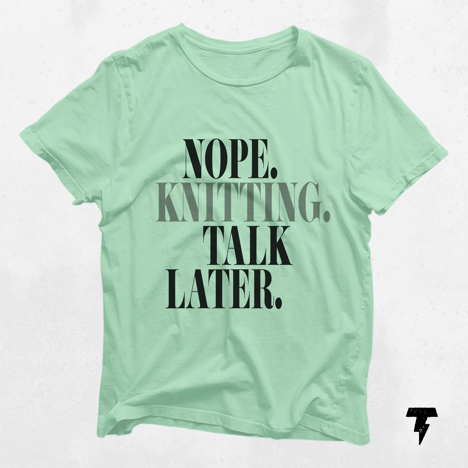 Funny knitting t-shirt with 'Nope. Knitting. Talk Later.' print, perfect for yarn lovers and crafters. Unisex jersey short sleeve tee.