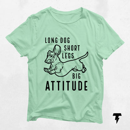 Mint green dachshund shirt featuring 'Long Dog, Short Legs, Big Attitude' text, perfect for dog moms and doxie lovers.