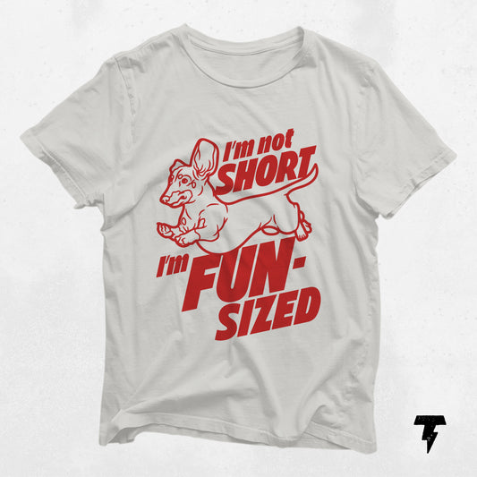 White Dachshund t-shirt with 'I'm not short, I'm fun-sized' slogan in red text, perfect dog lover gift.