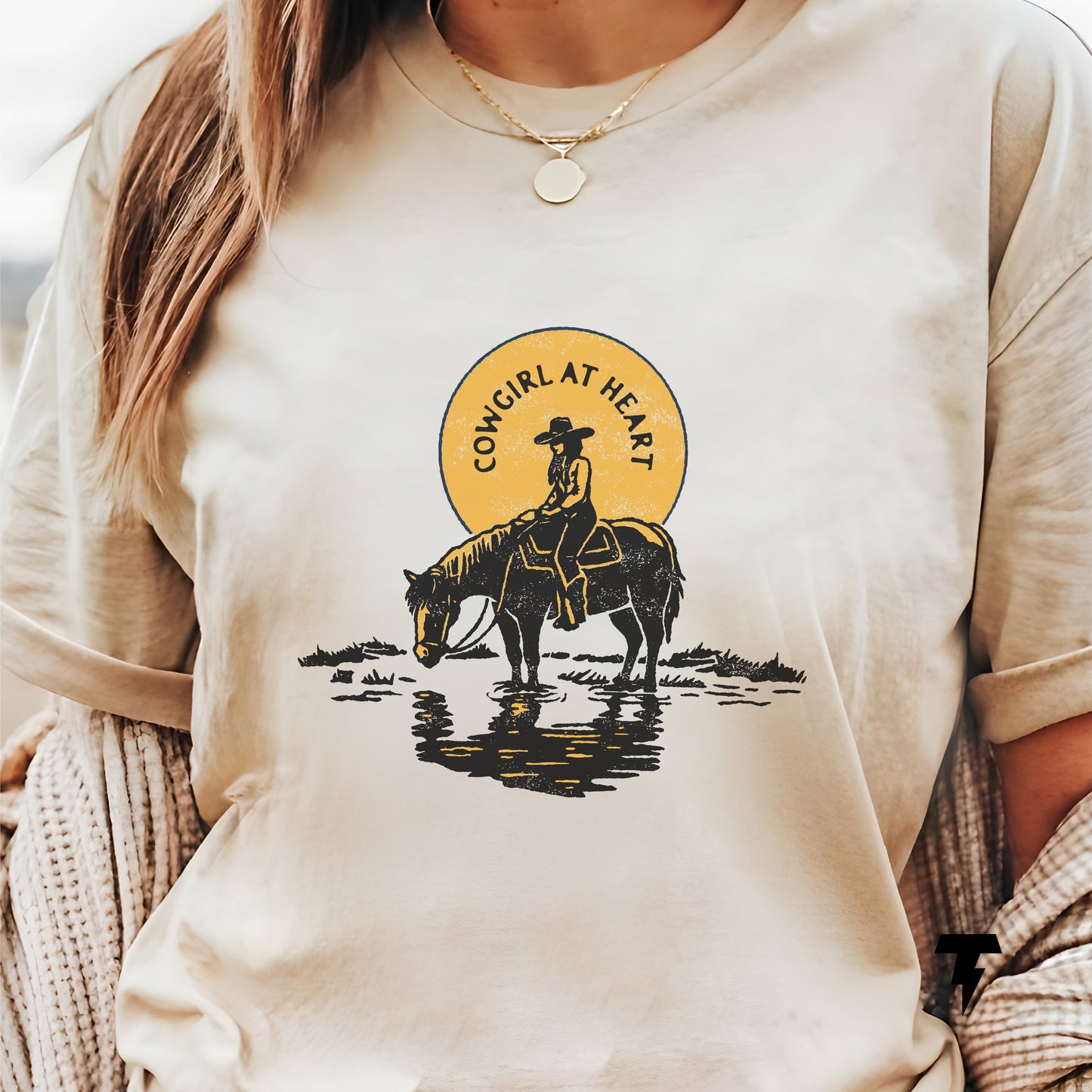 Woman wearing Cowgirl at Heart Shirt with a horse design, perfect for horse lovers and western style enthusiasts.