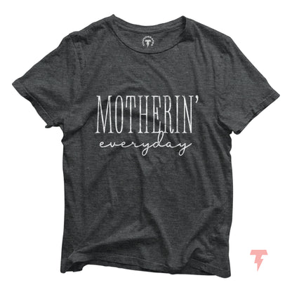 Funny 'Motherin' Everyday' mom t-shirt, perfect baby shower gift for mom, made of breathable cotton, casual fit, black with white print.