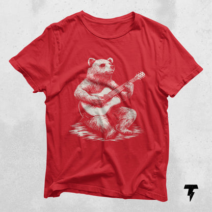 Red t-shirt featuring a bear playing guitar, perfect gift for musicians and guitarists. Breathable cotton with a retail fit.