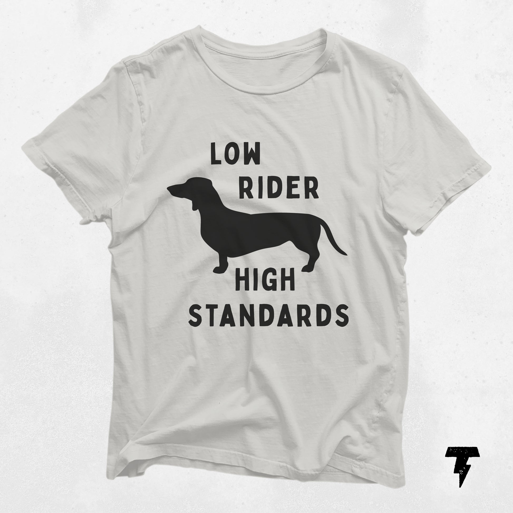 White Dachshund shirt with 'Low Rider High Standards' design, perfect gift for dog lovers and moms, featuring a silhouette of a wiener dog.