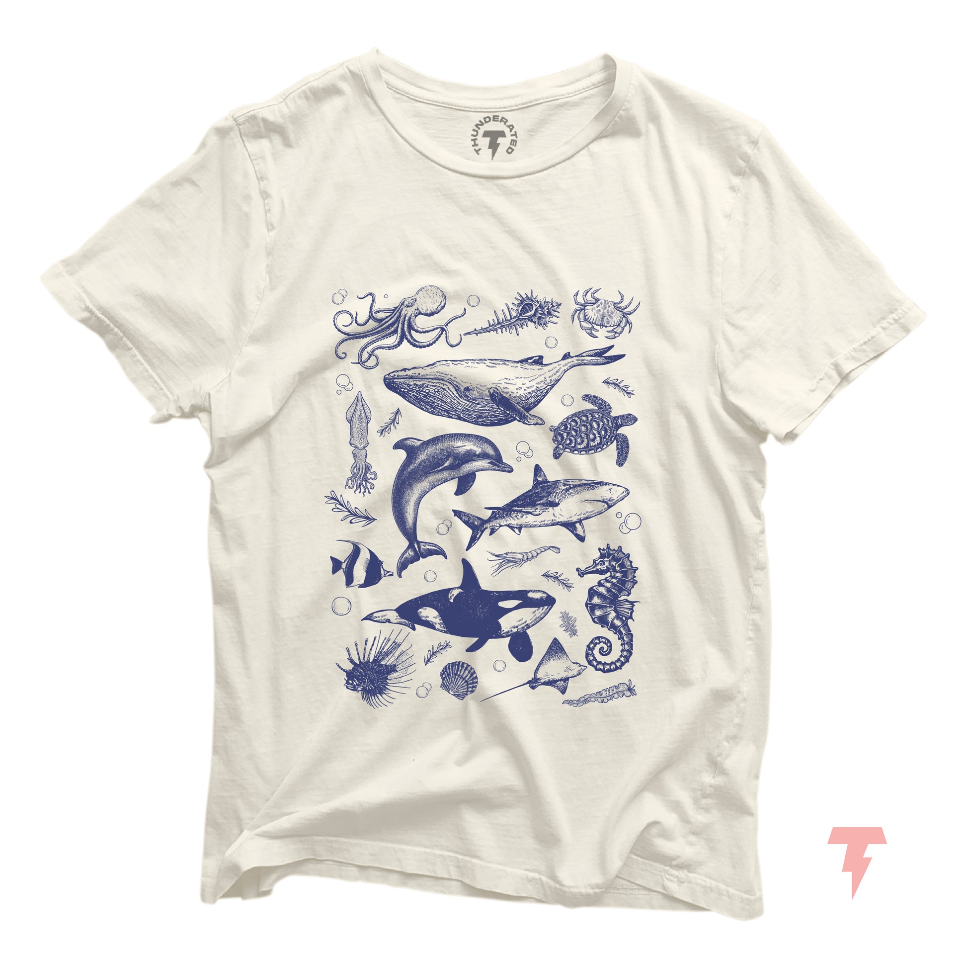 Vintage ocean wildlife shirt with illustrations of orcas, whales, dolphins, and sharks. Sea life animals on a white tee.