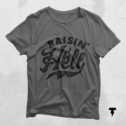 Raising Hell T-Shirt in gray with bold text, perfect for outspoken individuals, made from lightweight cotton with a retail fit.