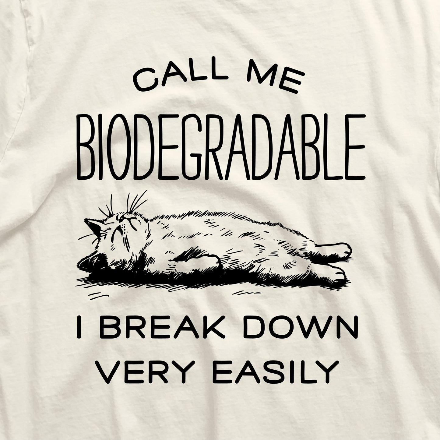 Funny cat shirt featuring a relaxed cat with the text 'Call me Biodegradable, I Break Down Very Easily.' Perfect gift for cat lovers.