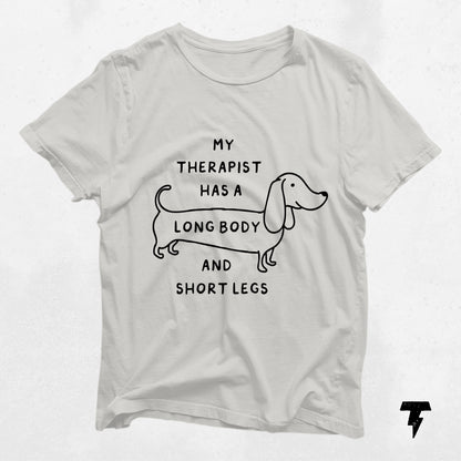 Long body dachshund shirt with 'My therapist has a long body and short legs' text, featuring a cute wiener dog design for dog lovers.