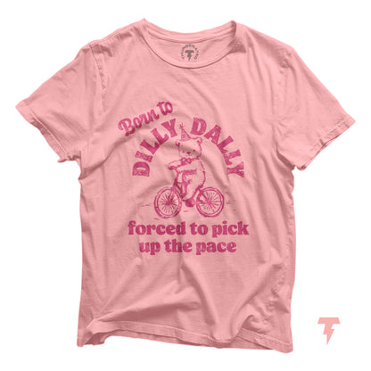 Pink funny T-shirt with 'Born to Dilly Dally, Forced to Pick Up the Pace' text and cycling bear graphic, ideal for crafters.