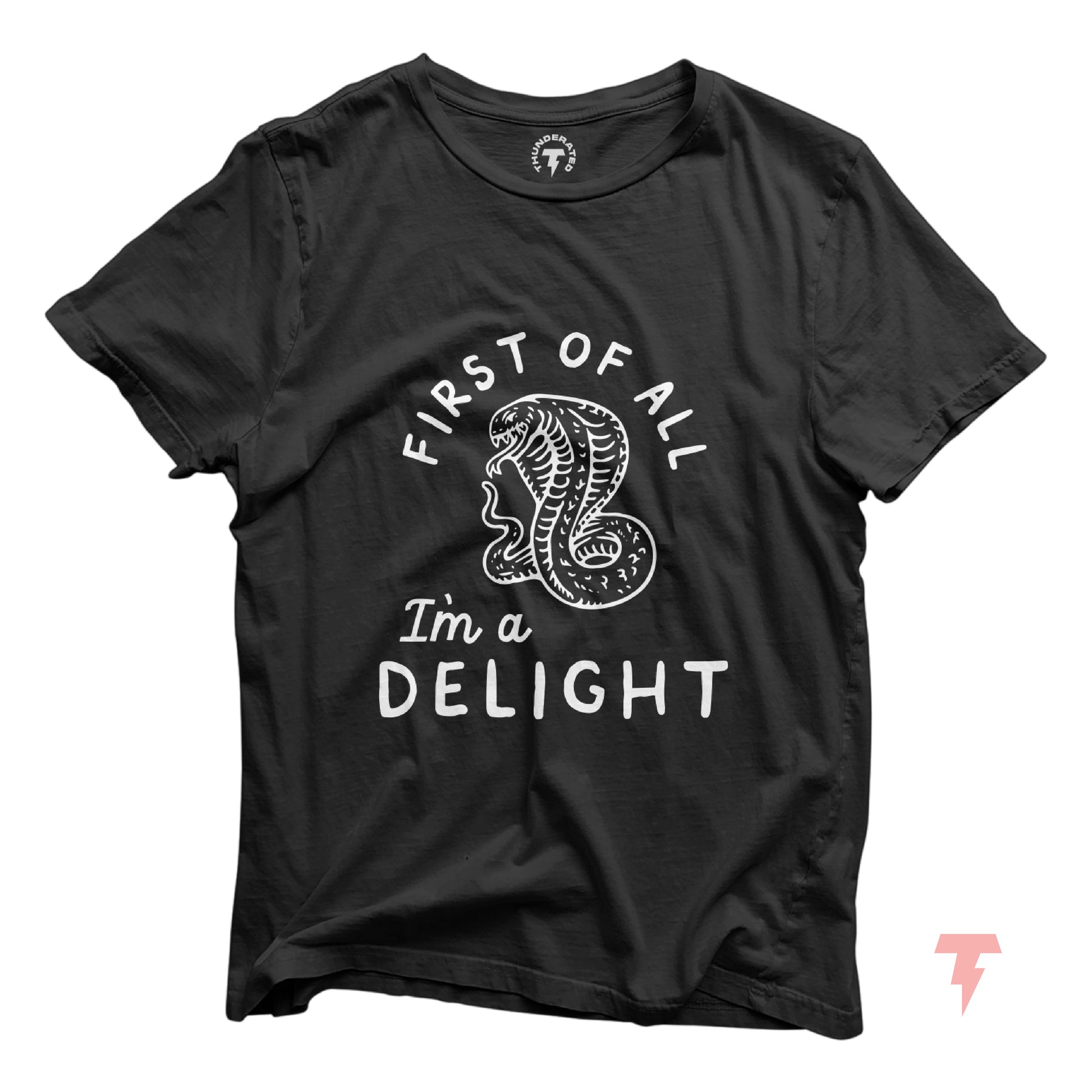 Black unisex t-shirt with 'First of all I'm a delight' text and a cobra graphic, made of soft Airlume cotton by Bella+Canvas.