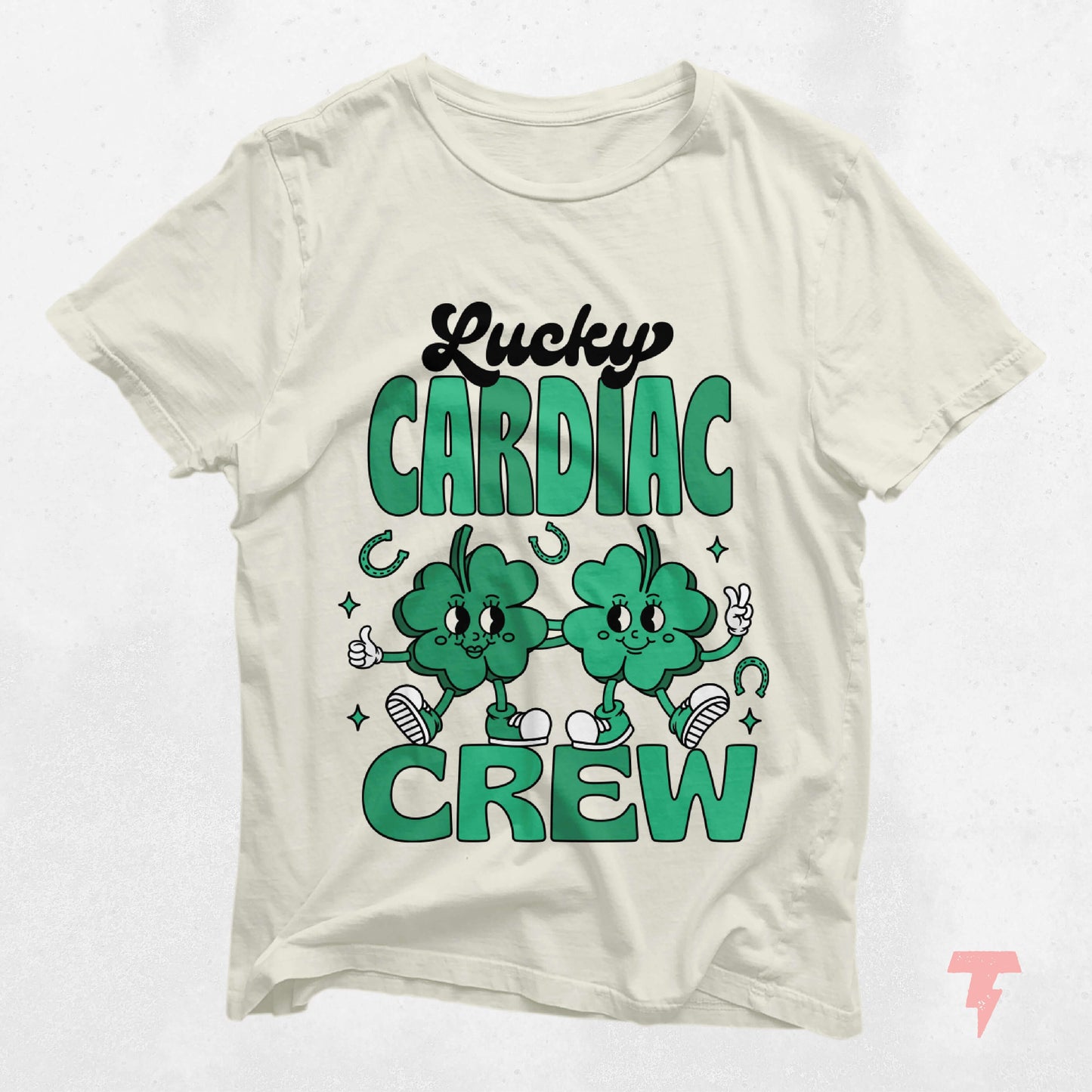 Lucky Cardiac Crew St. Patrick's Day shirt, featuring cartoon clovers, perfect for cardiology nurses celebrating with style and spirit.