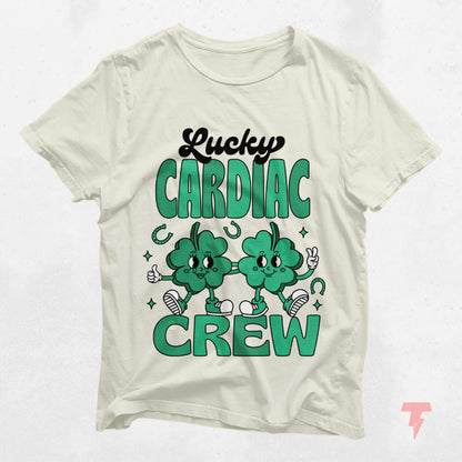 Lucky Cardiac Crew St. Patrick's Day shirt, featuring cartoon clovers, perfect for cardiology nurses celebrating with style and spirit.