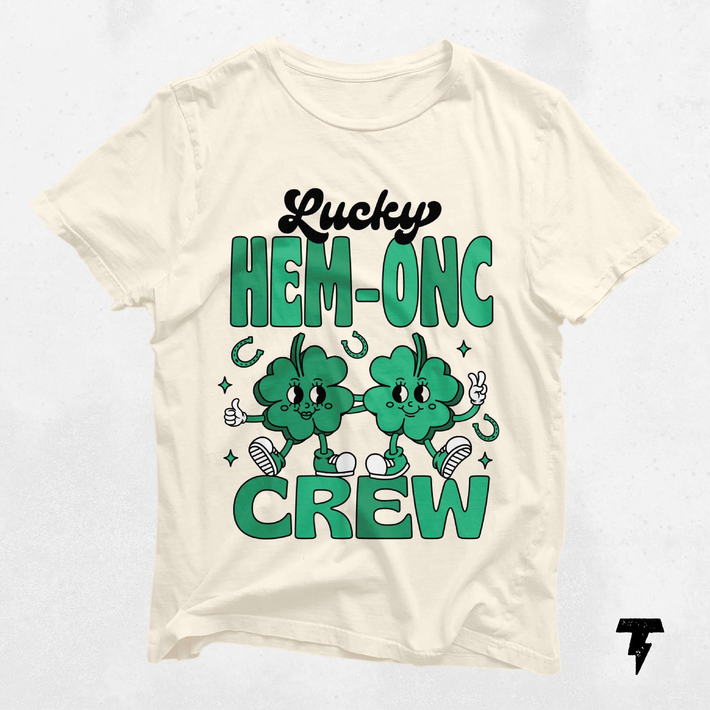 Lucky HEM-ONC Crew St. Patrick's Day Shirt with shamrocks, perfect for hematology oncology nurses, festive nurse gift idea.
