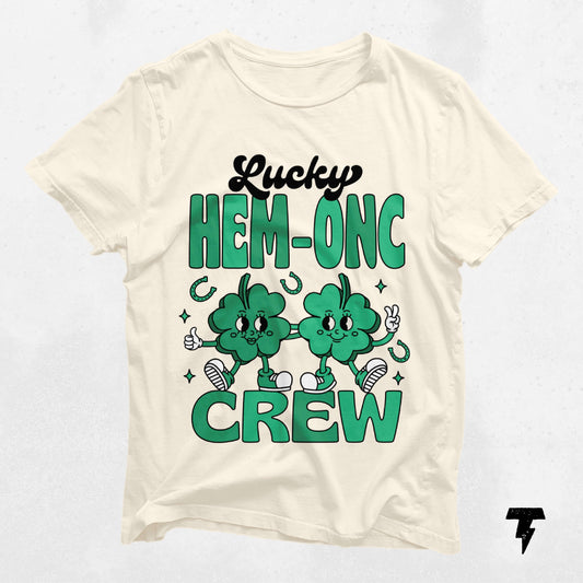 Lucky HEM-ONC Crew St. Patrick's Day Shirt with shamrocks, perfect for hematology oncology nurses, festive nurse gift idea.