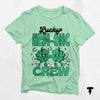 Lucky HEM-ONC Crew St. Patrick's Day shirt with cheerful shamrock design for nurses and oncologists. Festive nursing tee.