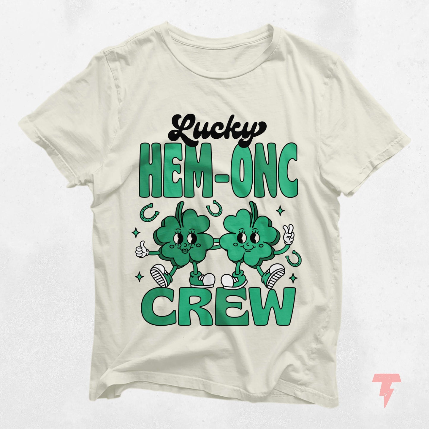 Lucky HEM-ONC Crew St. Patrick's Day shirt for hematology oncology nurses with festive green design and playful shamrocks.