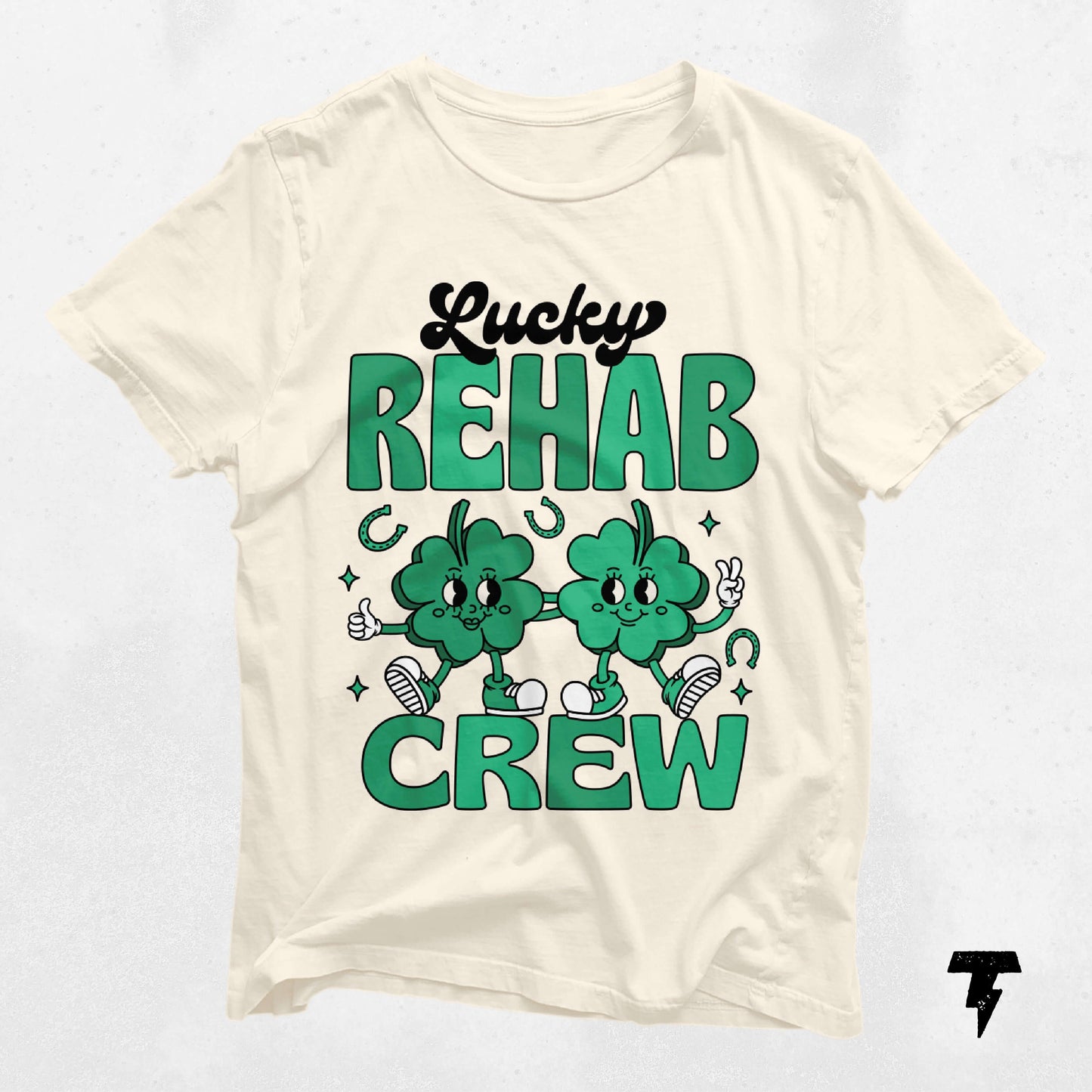 Lucky Rehab Crew St. Patrick's Day shirt featuring green clovers, designed for therapy professionals celebrating with style and comfort.