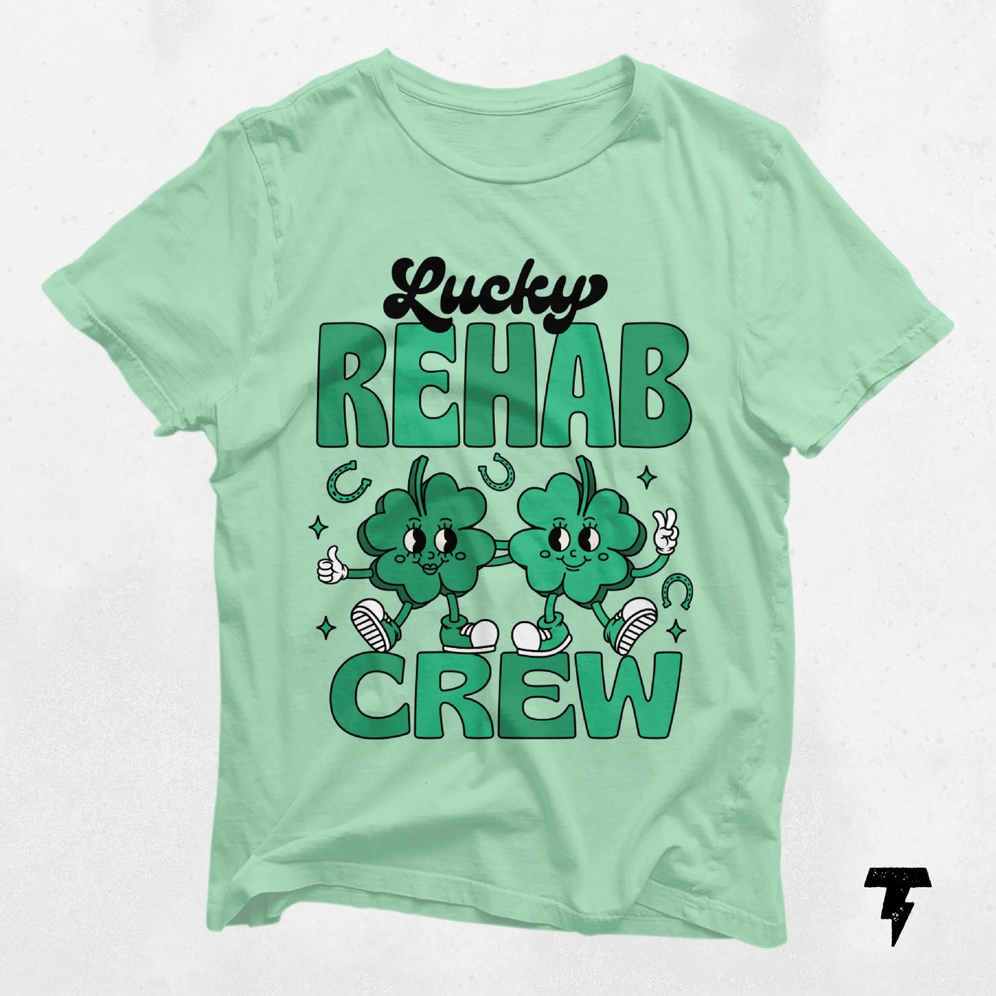 Green Lucky Rehab Crew St. Patrick's Day shirt with shamrock design, ideal for speech, occupational, and physical therapy fans.