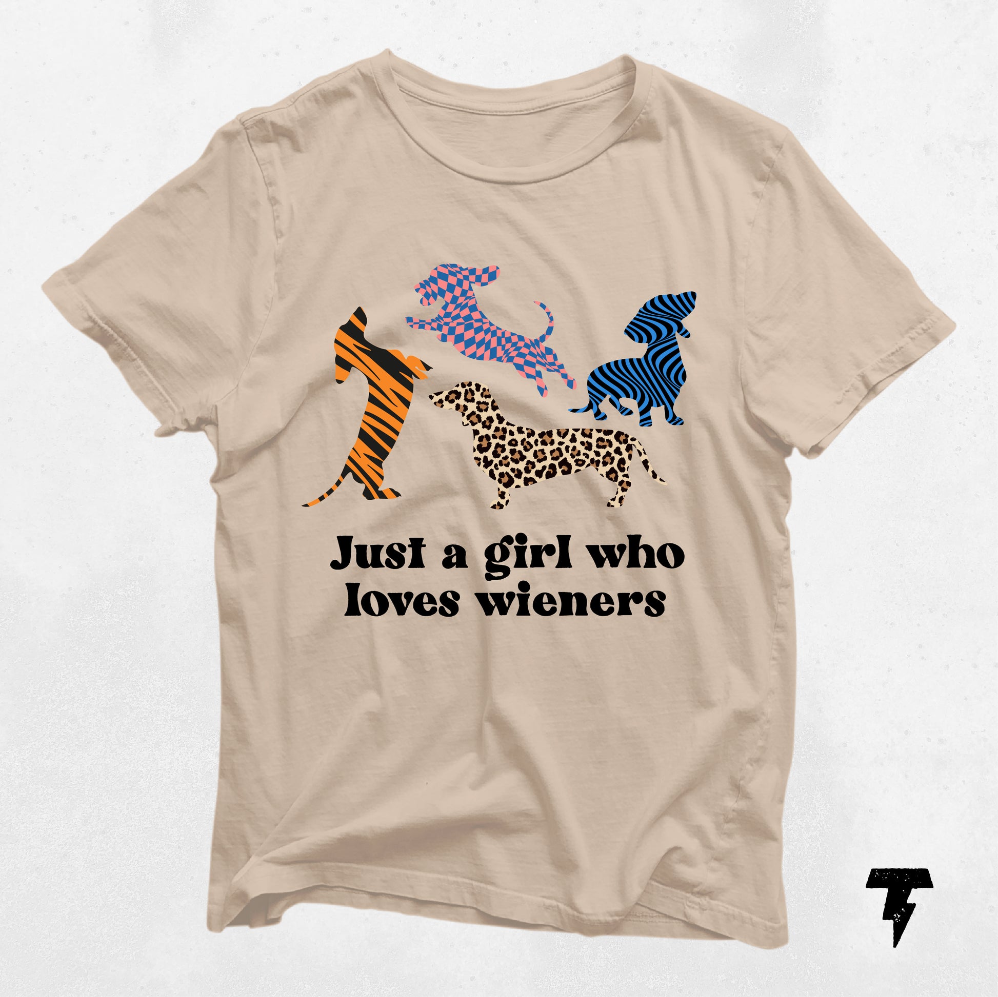 Beige 'Just a Girl Who Loves Wieners' dachshund graphic tee with colorful dog silhouettes, perfect gift for dog moms.