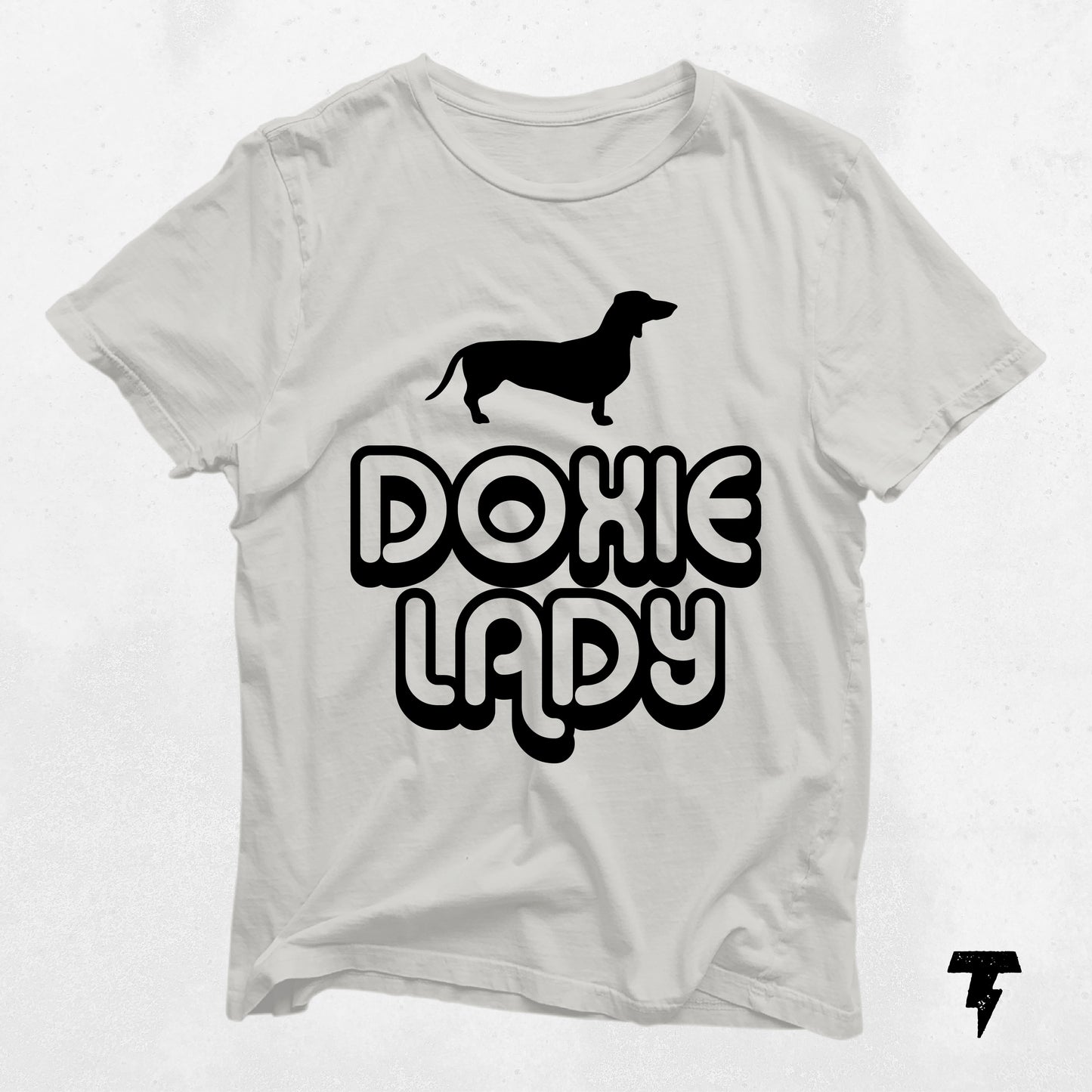White Doxie Lady Dachshund shirt with black print for dog lovers, unisex tee, perfect gift for dog moms, made from soft cotton.