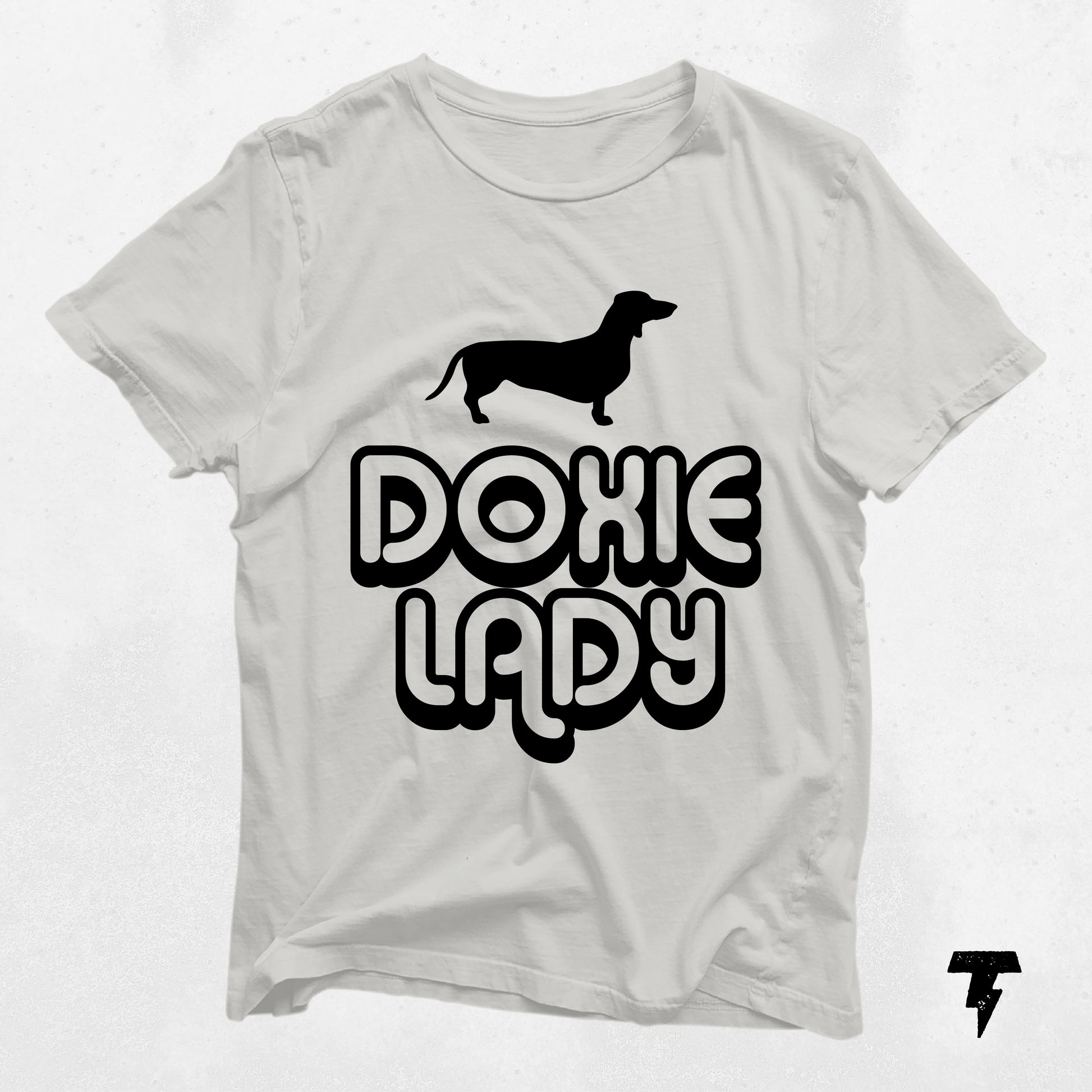 White Doxie Lady Dachshund shirt with black print for dog lovers, unisex tee, perfect gift for dog moms, made from soft cotton.