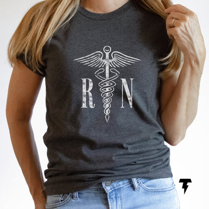 Registered Nurse t-shirt in dark gray for women or men with RN caduceus symbol, ideal for casual wear or gifts.