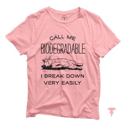 Funny pink cat shirt with 'Call me biodegradable, I break down easily' text, featuring a laid-back cat graphic. Ideal for cat lovers.
