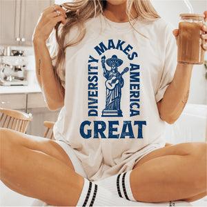A woman wearing a white t-shirt with a graphic design and holding a glass of what appears to be a beverage.