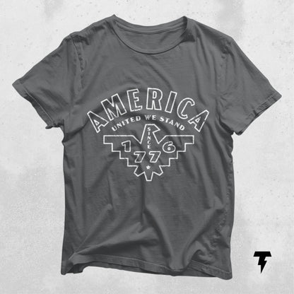 Patriotic gray 'America United We Stand Since 1776' shirt, ideal for Fourth of July and Memorial Day, 100% cotton.