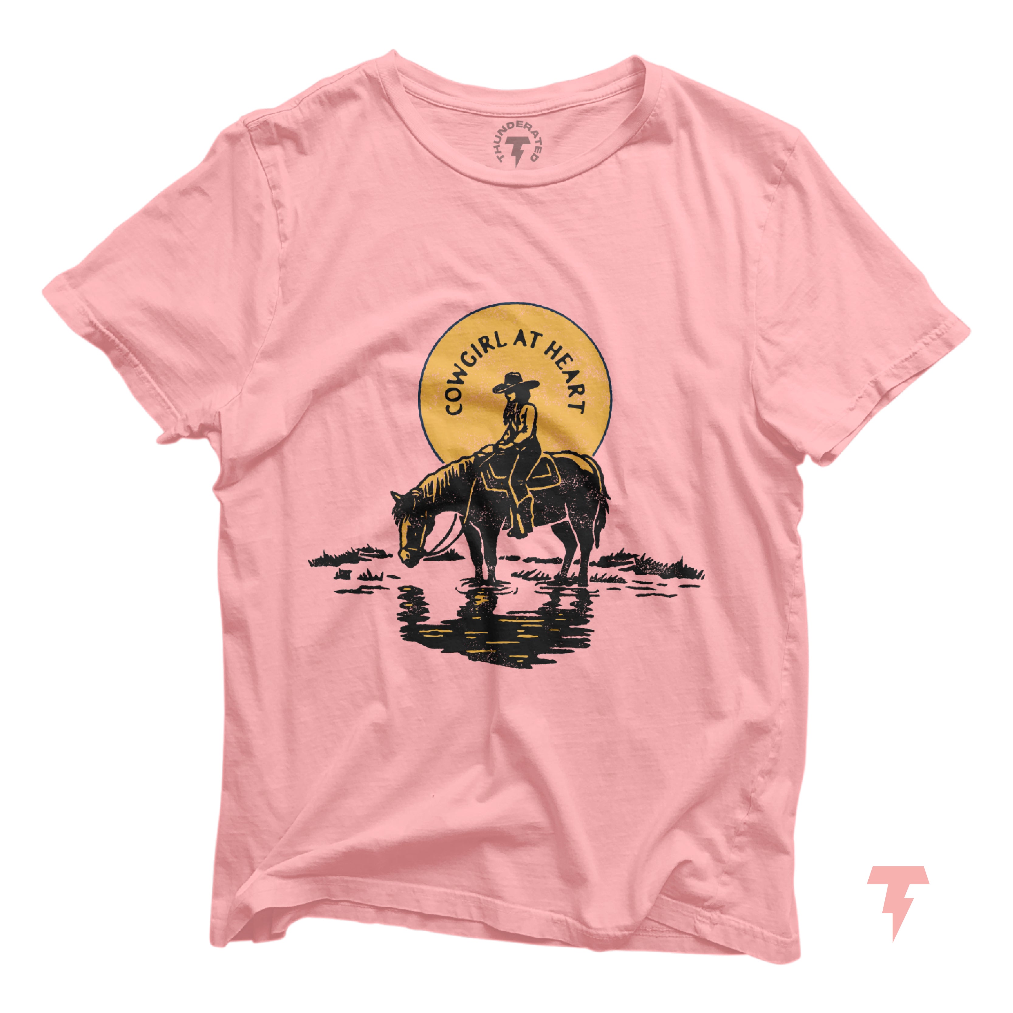 a pink shirt with an image of a cowboy on a horse