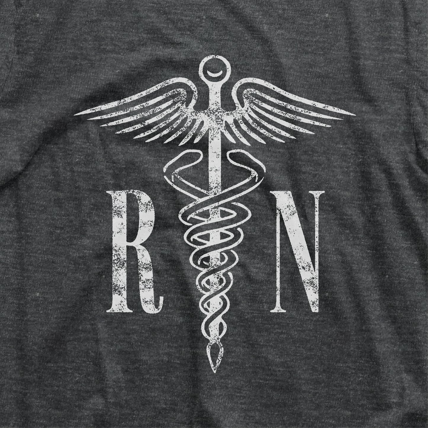 Dark grey RN shirt featuring a caduceus symbol, perfect for nurses or as a graduation gift for registered nurses.