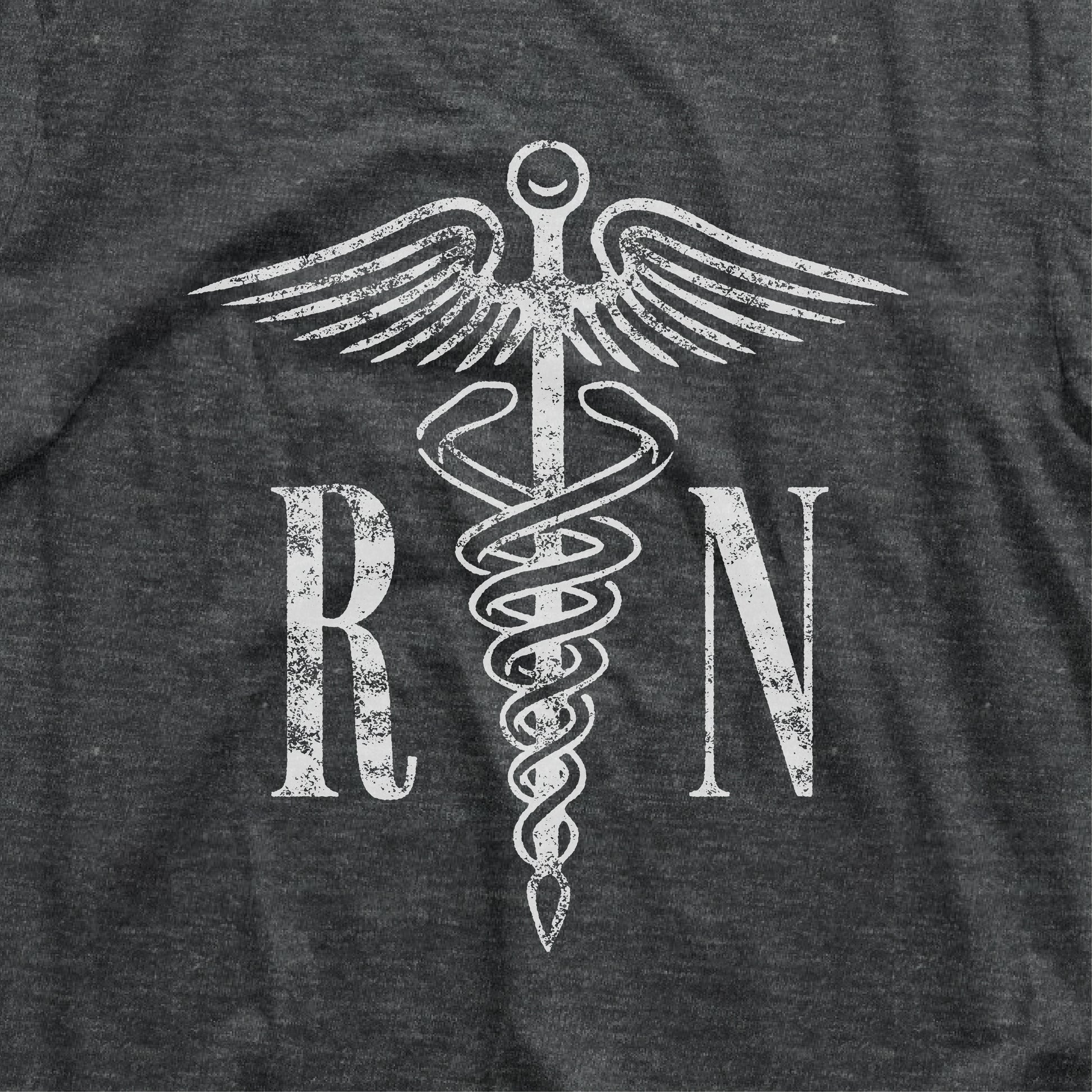 Dark grey RN shirt featuring a caduceus symbol, perfect for nurses or as a graduation gift for registered nurses.