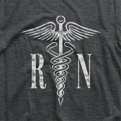 Dark grey RN shirt featuring a caduceus symbol, perfect for nurses or as a graduation gift for registered nurses.