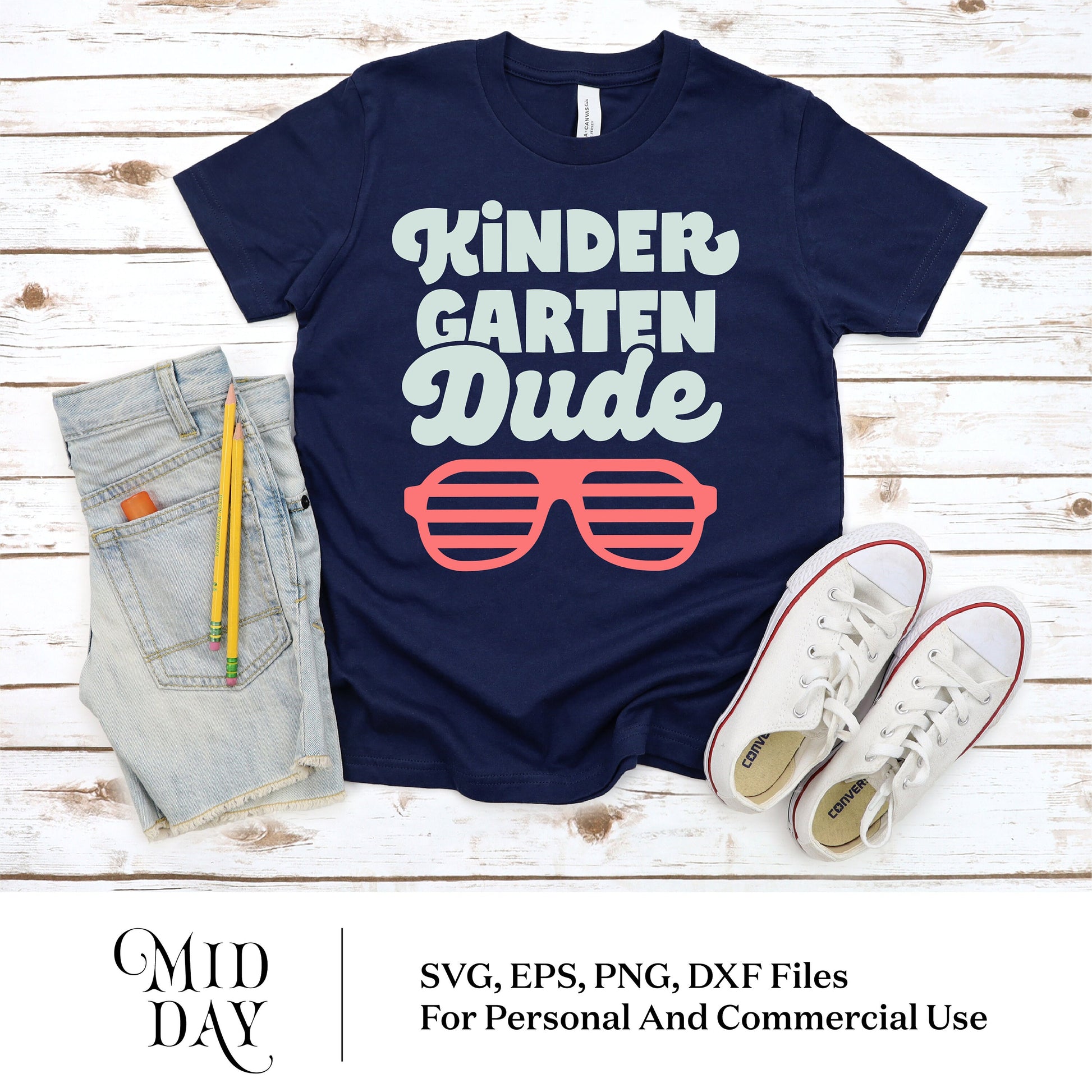 Navy blue t-shirt with 'Kindergarten Dude' text and sunglasses graphic, styled with jeans, pencils, and sneakers for back to school.