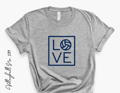 Gray T-shirt featuring a navy blue volleyball-themed 'LOVE' design, ideal for volleyball team supporters and Cricut projects.