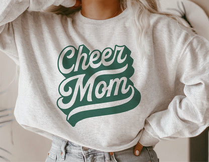 Gray sweatshirt featuring 'Cheer Mom' in green brushstroke lettering, ideal for team spirit or cheerleading events.