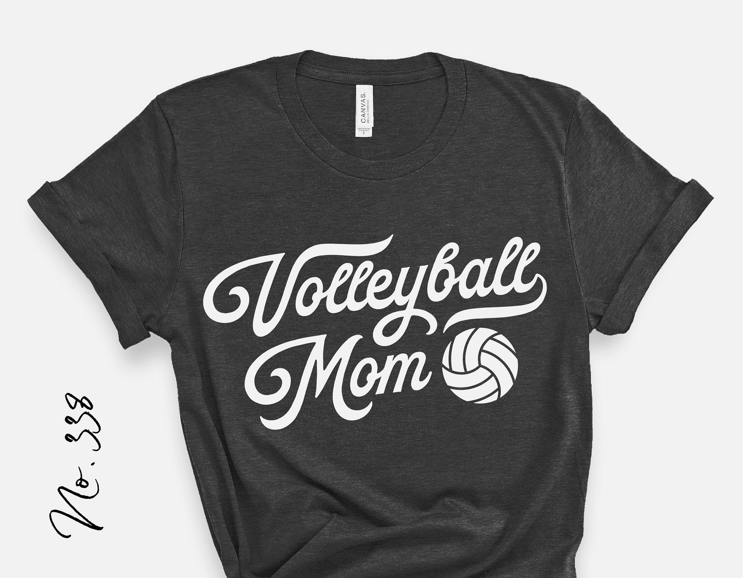 Black t-shirt with 'Volleyball Mom' and volleyball graphic in vintage font, perfect for sports moms and fans.
