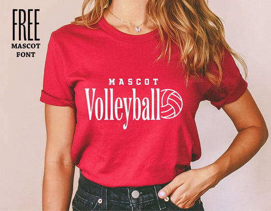 Person wearing a red t-shirt with 'Mascot Volleyball' logo, showcasing a free mascot font design, ideal for volleyball team spirit.