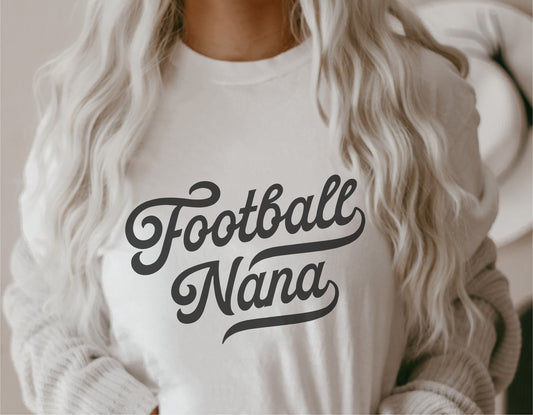White shirt with 'Football Nana' vintage text design, perfect for football fans and fashion enthusiasts.