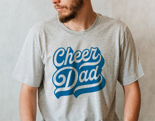 Cheer Dad t-shirt with blue lettering, perfect for supporting cheerleaders and team spirit activities.