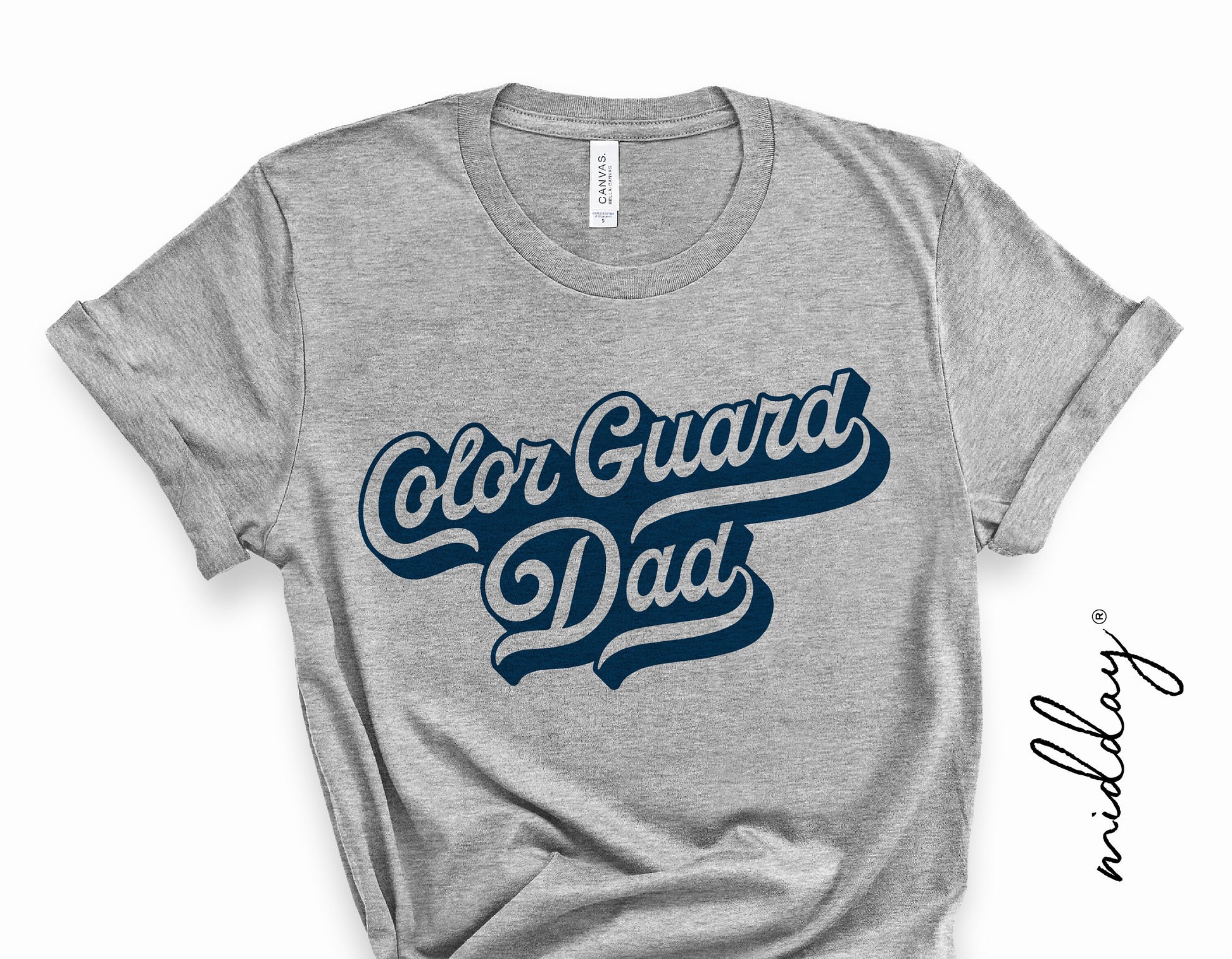 Gray t-shirt with 'Color Guard Dad' design, ideal for marching band enthusiasts and school spirit displays, in SVG and PNG formats.