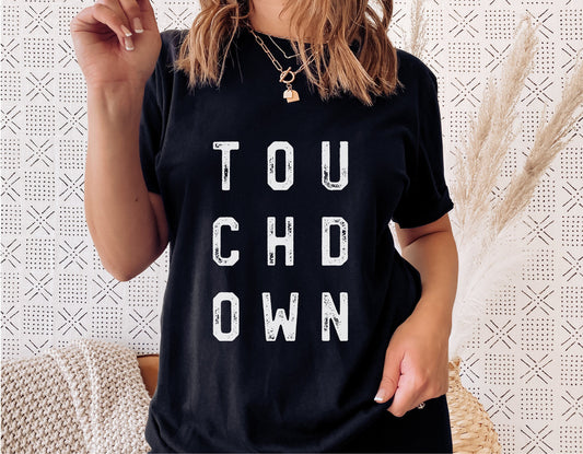 Black t-shirt with 'TOUCHDOWN' text design, perfect svg for football fans and Cricut projects, featuring a modern and stylish look.