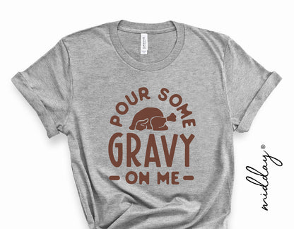 Gray t-shirt with 'Pour Some Gravy On Me' and turkey graphic, perfect for funny Thanksgiving and fall-themed cricut projects.